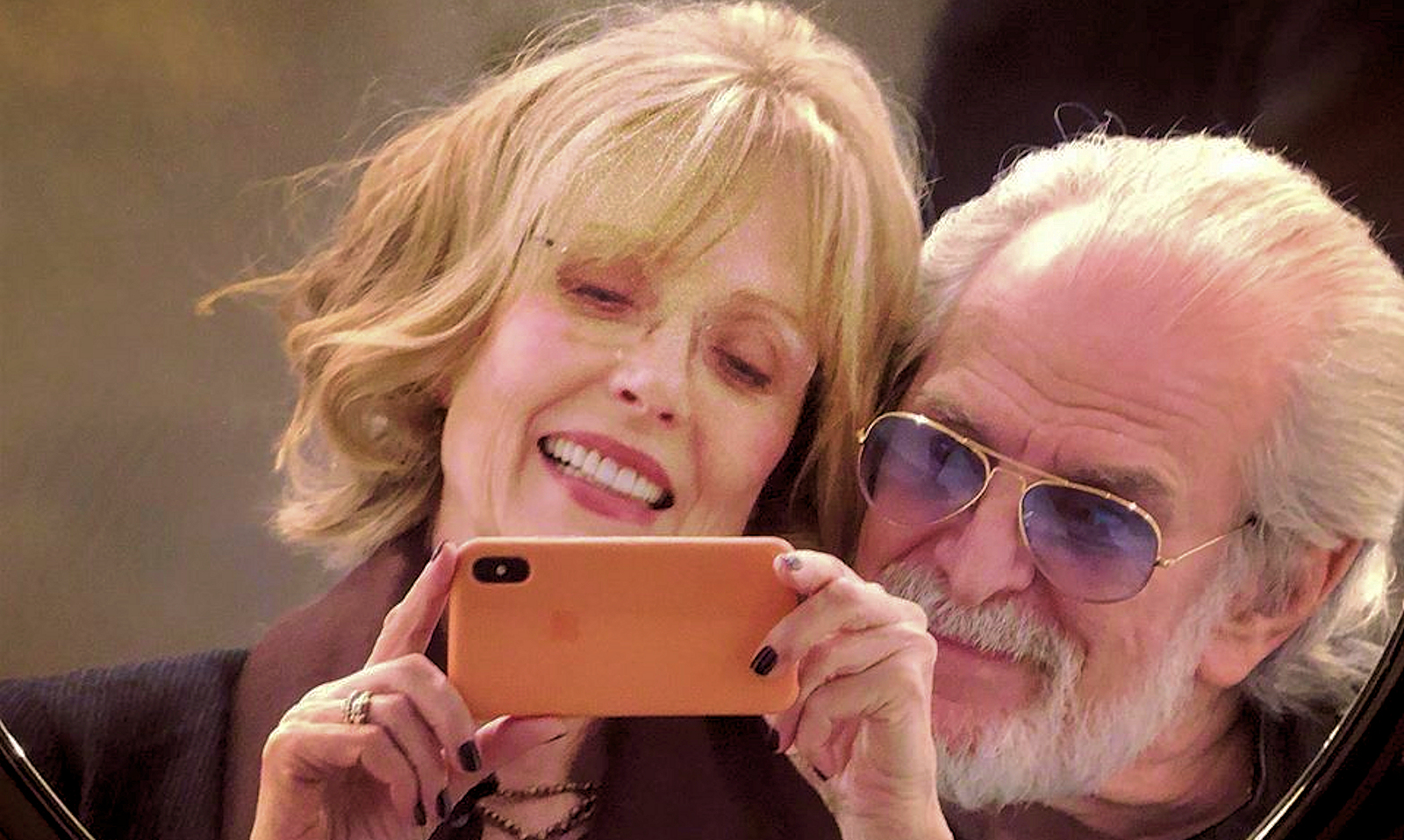 Susan Blakely and Steve Jaffe properly using a cellphone camera in Horizontal mode