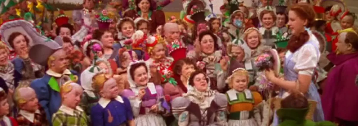 Judy Garland (Dorothy) and the Munchkins